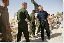 President George W. Bush greets U.S. Military personnel at Al Asad Airbase, Al Anbar Province, Iraq, Monday, September 3, 2007. White House photo by Eric Draper