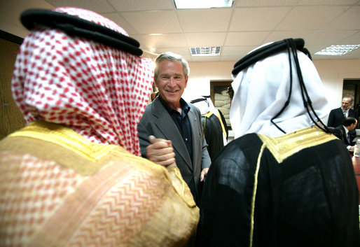 President George W. Bush greets local leaders of Al Anbar Province before their meeting at Al Asad Airbase, Al Anbar Province, Iraq, Monday, September 3, 2007. White House photo by Eric Draper