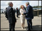 President George W. Bush greets Mrs. Janette Howard at the Man O War Steps Wharf in Sydney Wednesday, Sept. 5, 2007. The President joined Mrs. Howard and Prime Minister Howard for a social lunch with Australian troops. White House photo by Eric Draper