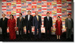 President George W. Bush joins leaders of the Association of Southeast Asian Nations for a photo opportunity Friday, Sept. 7, 2007, in Sydney. From left are: Prime Minister Surayud Chulanont of Thailand; Minister Rafidah Aziz of Malaysia; Sultan Haji Hassanal Bolkiah of Brunei; President Bush; Foreign Affairs Minister Noer Hassan Wirajuda of Indonesia; President Gloria Macapagal-Arroyo of the Philippines, and President Nguyen Minh Triet of Vietnam. White House photo by Chris Greenberg