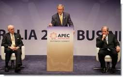 Flanked by Australia's Prime Minister John Howard, left, and Mark Johnson, Chairman of the APEC Business Advisory Council, President George W. Bush delivers remarks Friday, Sept. 7, 2007, to the APEC Business Summit at the Sydney Opera House. President Bush told his audience, "America's commitment to the Asia Pacific region was forged in war and sealed in peace. America is committed to the security of the Asia Pacific region, and that commitment is unshakable." White House photo by Eric Draper