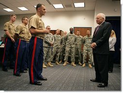 Vice President Dick Cheney talks with U.S. Marine Major Dan Whisnant Friday, Sept. 14, 2007, during a meeting with Marines of Alpha Company, 1st Batallion, 24th Regiment, left, and members of Michigan's Army National Guard, right, at the Gerald R. Ford Library and Museum in Grand Rapids, Mich. The Vice President thanked the troops for their service in Iraq and called their work with Iraqi tribal leaders a "great success story." White House photo by David Bohrer