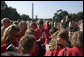 Mrs. Laura Bush hugs a woman during an event for military support organizations Tuesday, Sept. 18, 2007, on the South Lawn. White House photo by Shealah Craighead