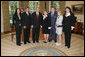 President George W. Bush meets with the 2007 Boys and Girls Clubs of America regional finalists, including Youth of the Year, Wednesday, Sept. 19, 2007 in the Oval Office. From left to right are, Reyneisha Sharp of Alton, Ill., Midwest Region Youth of theYear; Demetrice Tuttle of LaGrange, Ga., the 2007 National Youth of the Year; Brittny Cantero of Wharton, Texas, Southwest Region Youth of the Year; Gino Binkert of Pittsburgh, Pa., Northeast Region Youth of the Year; Sasha Andersen of Bullhead City, Ariz., Pacific Region Youth of the Year; and Roxanne Spillett, president of the Boys and Girls Clubs of America. White House photo by Joyce N. Boghosian