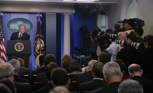 Members of the White House media focus their cameras on President George W. Bush Thursday, Sept. 20, 2007, during a morning press conference in the James S. Brady Briefing Room of the White House. White House photo by Chris Greenberg