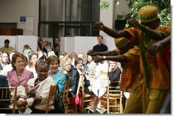 Mrs. Laura Bush listens to the African Children's Choir during a luncheon on global health and literacy Tuesday, Sept. 24, 2007, at the Pierpont Morgan Library in New York. White House photo by Shealah Craighead