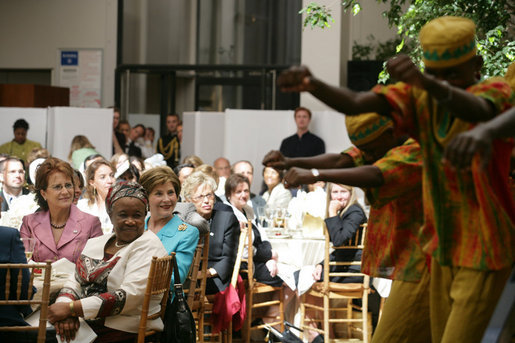 Mrs. Laura Bush listens to the African Children's Choir during a luncheon on global health and literacy Tuesday, Sept. 24, 2007, at the Pierpont Morgan Library in New York. White House photo by Shealah Craighead