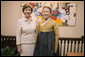 Mrs. Laura Bush meets with Madam Yoo (Ban) Soon-taek, wife of United Nations Secretary General Ban Ki-moon, during a UN hosted tea Tuesday, Sept. 25, 2007 in New York. White House photo by Shealah Craighead