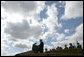 President George W. Bush delivers remarks during an Armed Forces farewell tribute in honor of Marine General Peter Pace and Armed Forces hail in honor of Navy Admiral Michael Mullen, Monday, October 1, 2007 at Fort Myer, Virginia. Speaking in honor of General Pace, President Bush said, "General Pace, throughout your life, you have led those troops to honorable achievements and into the pages of history. Because of your example, you can know that with courage, valor and confidence, they will take it from here". White House photo by Eric Draper