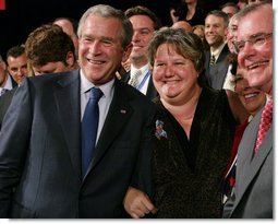 President George W. Bush stands with Karen Woodings of the Central Pennsylvania Food Bank following his address to the Lancaster Chamber of Commerce and Industry at the Jay Group Inc., Wednesday, Oct. 3, 2007 in Lancaster, Pa. President Bush joked with Woodings during the question and answer segment of his visit when she became nervous asking him a question. White House photo by Chris Greenberg