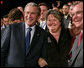 President George W. Bush stands with Karen Woodings of the Central Pennsylvania Food Bank following his address to the Lancaster Chamber of Commerce and Industry at the Jay Group Inc., Wednesday, Oct. 3, 2007 in Lancaster, Pa. President Bush joked with Woodings during the question and answer segment of his visit when she became nervous asking him a question. White House photo by Chris Greenberg