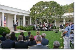 President George W. Bush discusses the reauthorization of the No Child Left Behind Act Tuesday, Oct. 9, 2007, in the Rose Garden. "We just had a meaningful discussion about our joint commitment to closing an achievement gap that exists in America. We discussed why reauthorizing the No Child Left Behind Act is vital in ensuring that we have a hopeful America," said President Bush. White House photo by Eric Draper