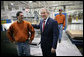 President George W. Bush meets with employees at Stribling Packaging Inc., Monday, Oct. 15, 2007 in Rogers, Ark., during a tour of the facility that specializes in the design of corrugated boxes and point-of-purchase displays. White House photo by Eric Draper