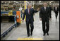 President George W. Bush tours the Stribling Packaging Inc., Monday, Oct. 15, 2007 in Rogers, Ark., with company President Bill Stribling. The facility specializes in the design of corrugated boxes and point-of-purchase displays. President Bush later met for lunch with local business leaders and delivered an address on fiscal responsibility. White House photo by Eric Draper