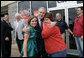 President George W. Bush is greeted outside the Whole Hog Cafe in Rogers, Ark., as he arrives for a lunch meeting with local business leaders Monday, Oct. 15, 2007. White House photo by Eric Draper