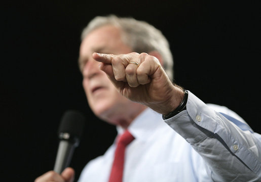 President George W. Bush gestures to make a point during his remarks to an audience at the John Q. Hammons Convention Center in Rogers, Ark., Monday, Oct. 15, 2007, urging Congress to be fiscally responsible with the taxpayer’s money. White House photo by Eric Draper