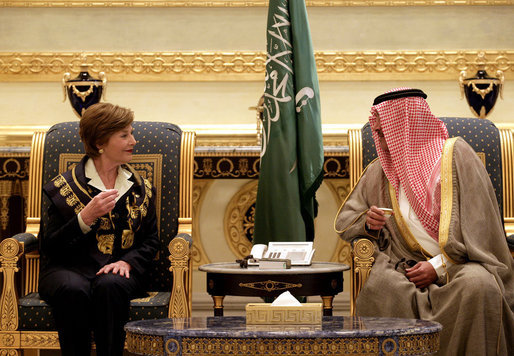 After arriving in Riyadh, Tuesday, Oct. 23, 2007, Mrs. Laura Bush talks with Prince Faisal Bin Abdallah Bin Abd al-Aziz Al Saud, President of the Saudi Cancer Society and President of the Saudi Red Crescent Society. White House photo by Shealah Craighead