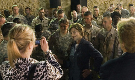 Mrs. Laura Bush poses for pictures after addressing American troops Thursday, Oct. 25, 2007, at Ali Al Salem Air Base, Kuwait. It is the third country visited by the First Lady on her four-country, Mideast tour. White House photo by Shealah Craighead