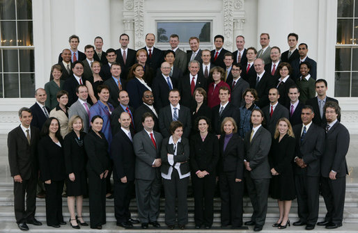 President George W. Bush stands amidst recipients of the 2006 Presidential Early Career Awards for Scientists and Engineers during a photo opportunity Thursday, Nov. 1, 2007, on the North Portico of the White House. Established in 1996, PECASE represents the highest honor that any young scientist or engineer can receive in the United States. White House photo by Chris Greenberg