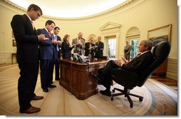 President George W. Bush meets in the Oval Office Thursday morning, Nov. 1, 2007, with members of the White House Press Corps with whom he gave a quick preview of his remarks on the Global War on Terror that later were delivered to the Heritage Foundation in Washington, D.C. White House photo by Joyce N. Boghosian