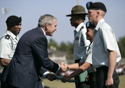 President George W. Bush shakes hands with recipients of outstanding soldier awards during the Basic Combat Training Graduation Ceremonies Friday, Nov. 2, 2007, at Fort Jackson in Columbia, S.C. Fort Jackson is the largest and most active Initial Training Center in the U.S. Army, training an average of 50,000 soldiers per year. White House photo by Eric Draper