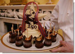 A "Lafayette" cake dessert is served to guests Tuesday evening, Nov. 6, 2007, during the White House dinner in honor of French President Nicolas Sarkozy. The cake honors the 250th anniversary of the birth of French soldier and statesman the Marquis de Lafayette, who was pivitol in America's war for independence. White House photo by Shealah Craighead