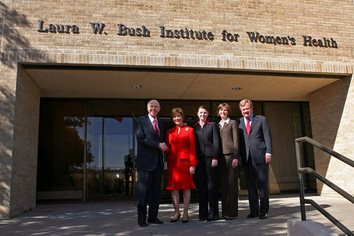 Mrs. Bush shakes hands with Chancellor Kent Hance, Texas Tech University System, as she stands with Dr. Marjorie Jenkins, Erin Thurston and Dr. John Baldwin in front of the Laura W. Bush Institute for Women's Health at TTU, Amarillo Campus Wednesday, Nov. 7, 2007, in Amarillo, Texas. White House photo by Shealah Craighead