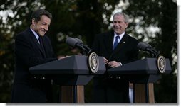 President George W. Bush shares a laugh with President Nicolas Sarkozy of France as they participate in a joint press availability Wednesday, Nov. 7, 2007, at Mount Vernon, Va. White House photo by Eric Draper