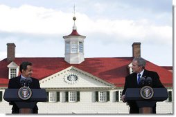 With Mount Vernon as a backdrop, President George W. Bush and President Nicolas Sarkozy of France participate in a joint press availability Wednesday, Nov. 7, 2007. The visit to the Virginia home of George Washington capped a two-day visit by the French leader to the nation's capital. White House photo by Chris Greenberg