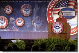 Mrs. Laura Bush speaks during a conference on Helping America's Youth Thursday, Nov. 8, 2007, at Dallas Baptist University in Dallas. "To make sure every child is surrounded by these positive influences, even more adults must dedicate themselves to helping young people," said Mrs. Bush. "Adults should be aware of the challenges facing children, and then they should take an active interest in children's lives. Adults, and especially parents, should build relationships where they teach their children healthy behaviors by their own good example." White House photo by Shealah Craighead