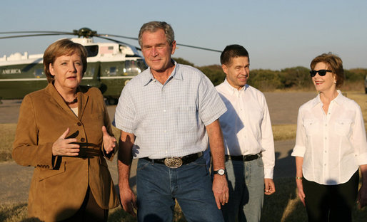 President George W. Bush listens as German Chancellor Angela Merkel thanks President Bush and Mrs. Laura Bush for their weekend invitation to her and her husband, Dr. Joachim Sauer, to the Bush ranch in Crawford, Texas, Friday, Nov. 9, 2007. White House photo by Shealah Craighead