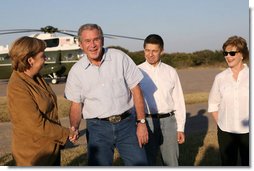 President George W. Bush and Mrs. Laura Bush welcome German Chancellor Angela Merkel and her husband, Dr.Joachim Sauer, to the Bush ranch in Crawford, Texas, Friday, Nov. 9, 2007. White House photo by Shealah Craighead