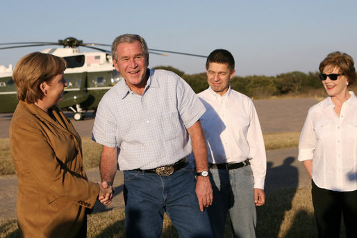 President George W. Bush and Mrs. Laura Bush welcome German Chancellor Angela Merkel and her husband, Dr.Joachim Sauer, to the Bush ranch in Crawford, Texas, Friday, Nov. 9, 2007. White House photo by Shealah Craighead