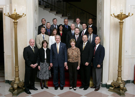 President George W. Bush and Mrs. Laura Bush stand with the crew members of the Space Shuttle Discovery (STS-116), Space Shuttle Atlantis (STS-117), Space Shuttle Endeavour (STS-118), and International Space Station Expeditions 14 and 15, Wednesday, Nov. 14, 2007 in the Grand Foyer of the White House. Since December 2006, NASA astronauts have journeyed more than 15 million miles in space and conducted more than a dozen space walks. White House photo by Chris Greenberg