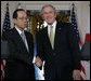 President George W. Bush and Prime Minister Yasuo Fukuda of Japan exchange handshakes following their joint statement Friday, Nov. 16, 2007, at the White House. White House photo by Chris Greenberg