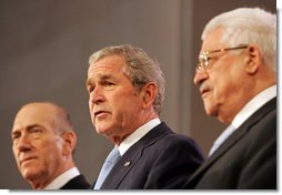 President George W. Bush reads from a joint statement by Israeli Prime Minister Ehud Olmert and Palestinian President Mahmoud Abbas, in which the leaders pledged to resume Mideast peace talks. The statement came during the Annapolis Conference in Annapolis, Maryland, and read, in part: "We express our determination to bring an end to bloodshed, suffering and decades of conflict between our peoples; to usher in a new era of peace, based on freedom, security, justice, dignity, respect and mutual recognition; to propagate a culture of peace and nonviolence; to confront terrorism and incitement, whether committed by Palestinians or Israelis." White House photo by Chris Greenberg