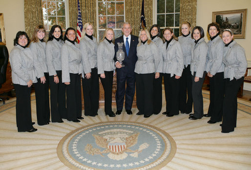 President George W. Bush welcomes the members of the U.S. Solheim Cup team to the Oval Office, Thursday, Nov. 29, 2007, to honor them for their 2007 Solheim Cup victory in Halmstad, Sweden, the most prestigious team award in women’s golf. Left to right are golfers Patricia "Pat" Hurst, Paula Creamer, Nicole Castrale, Sheryl "Sherri" Steinhauer, Brittany Lincicome, Morgan Pressel, Mary Beth "Betsy" King, Laura Diaz, Angela Stanford, Natalie Gulbis, Stacy Prammanasudh, Juli Inkster and Cristie Kerr. White House photo by Eric Draper