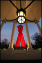 A red ribbon adorns the North Portico of the White House Friday, Nov. 30, 2007, in recognition of World AIDS Day and the commitment by President George W. Bush and his administration to fighting and preventing HIV/AIDS in America and the world. White House photo by Eric Draper