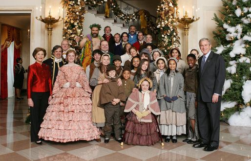 President George W. Bush and Mrs. Laura Bush pose for a photo with the Ford's Theater cast members of “A Christmas Carol,” following their performance Monday, Dec. 3, 2007, at the White House Children’s Holiday Reception. White House photo by Shealah Craighead