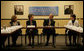 President George W. Bush participates in a meeting on health care Wednesday, Dec. 5, 2007, during a visit to the OneWorld Community Health Centers, Inc. in Omaha. Said the President afterwards, "This center serves -- 85 percent of its people don't speak English as a first language. By far, the vast majority are low-income. And yet they're receiving first-class quality care. So I thank the docs and the nurses and the social workers, and all the people who are making this facility such a good one." White House photo by Chris Greenberg