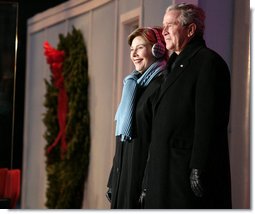 President George W. Bush and Mrs. Laura Bush arrive on stage at the Ellipse in Washington, D.C., Thursday, Dec. 6, 2007, for the lighting of the National Christmas Tree. White House photo by Shealah Craighead