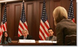 President George W. Bush participates in a meeting Tuesday, Dec. 11, 2007, on the Monitoring the Future Study on teen drug use. The study tracks drug use among America's young people and according to the latest study, there are more than 800,000 fewer young people using illicit drugs today than there were in 2001. With the President are Sara Johnson, left, 16, from Michigan, and Justin Calderon, 19, from California, both recovering addicts.  White House photo by Chris Greenberg