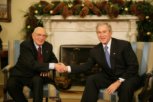 President George W. Bush and President Giorgio Napolitano exchange handshakes during the Italian leader's visit Tuesday, Dec. 11, 2007, to the White House. President Bush told his counterpart, "It's my honor to welcome you. Bilateral relations with the United States and Italy are very good. We have a lot of interchange between our countries, with business as well as travel." White House photo by Eric Draper