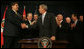 President George W. Bush shakes the hand of Peru's President Alan Garcia after signing H.R. 3688, the United States-Peru Trade Promotion Agreement Implementation Act, Friday, Dec. 14, 2007, in the Dwight D. Eisenhower Executive Office Building. In signing the agreement, the President said, "Peru and the United States are strong partners and today we're making that partnership even stronger." White House photo by Joyce N. Boghosian