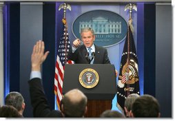 President George W. Bush calls on a reporter during a morning press conference Thursday, Dec. 20, 2007, in the James S. Brady Briefing Room of the White House. White House photo by Chris Greenberg