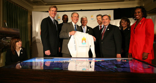 President George W. Bush and Chicago Mayor Richard Daley hold up a T-shirt touting Chicago 2016, during a meeting Monday, Jan. 7, 2008, with with members of the Chicago 2016 Bid Committee and the U.S. Olympic Committee. Said the President, "This country supports your bid, strongly. And our hope is that the judges will take a good look at Chicago and select Chicago for the 2016 Olympics." White House photo by Joyce N. Boghosian