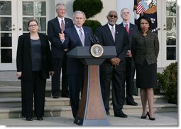 President George W. Bush addreses members of the media in the White House Rose Garden following his video teleconference Tuesday, Jan. 8, 2008, with Iraq Provincial Reconstruction Team Leaders and Brigade Combat Commanders. President Bush is joined from left by Kristin Hagerstrom, John Smith, Dr. John Jones, U.S. Secretary Condoleezza Rice and Deputy Secretary of Defense Gordon England. The PRT's mission is to help strengthen moderate Iraqi leaders at the local, municipal and provincial level by providing assistance to help create jobs, deliver basic services and build up local economies. White House photo by Chris Greenberg