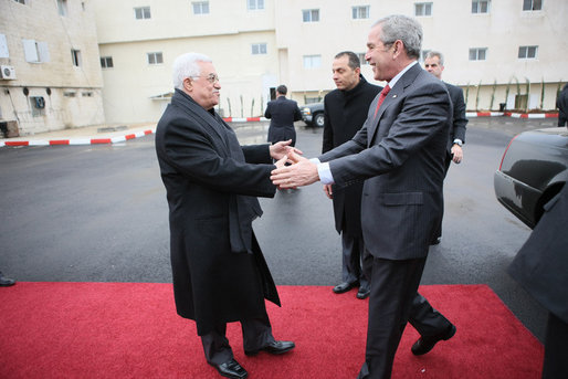 President George W. Bush is greeted at Muqata by President Mahmoud Abbas of the Palestinian Authority upon his arrival Thursday, Jan. 10, 2008, in Ramallah. White House photo by Eric Draper