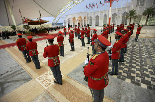 Honor guards stand at attention Friday, Jan. 11, 2008, during arrival ceremonies for President George W. Bush at Kuwait International Airport in Kuwait City. White House photo by Eric Draper