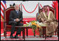 President George W. Bush and King Hamad Bin Isa Al-Khalifa break out in laughter as they sit on stage for the arrival ceremonies welcoming President Bush to Bahrain Saturday, Jan. 12, 2008, in Manama. White House photo by Eric Draper